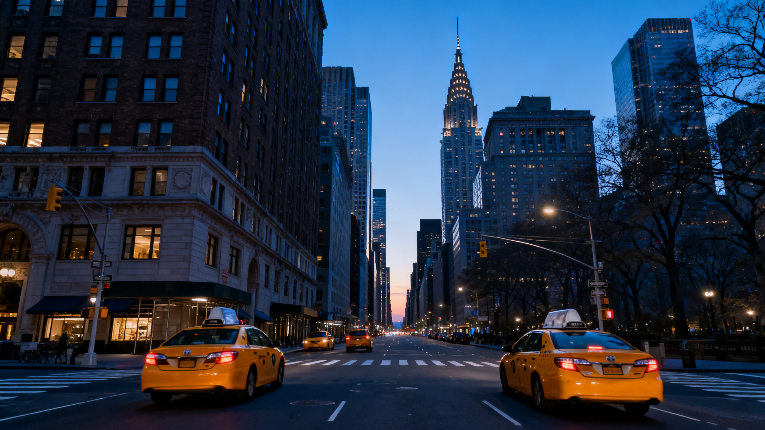 The vibrant streets of Manhattan with yellow taxis and towering skyscrapers under an early morning sky