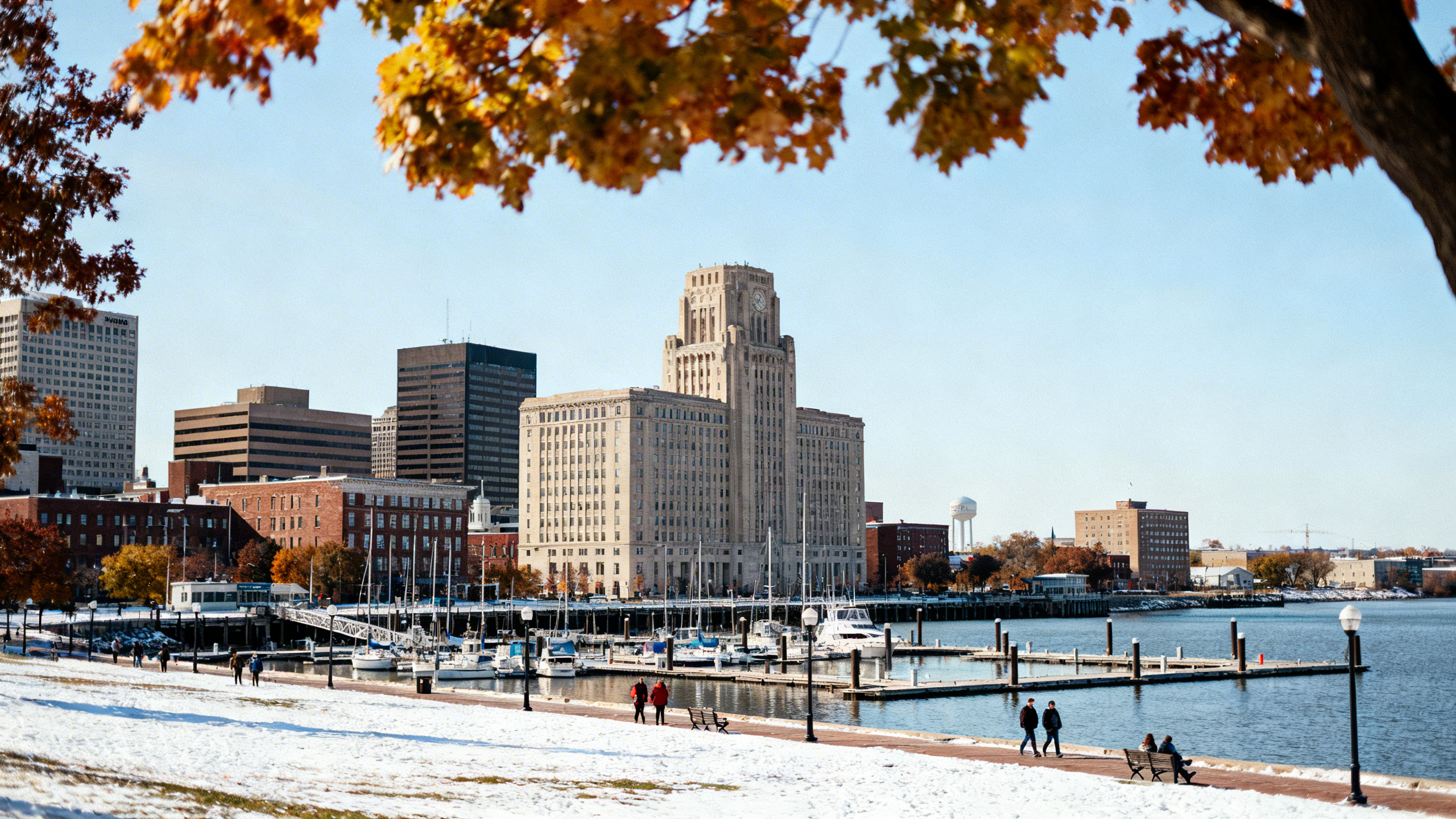 Snow-free view of Buffalo’s waterfront with marina and downtown buildings on a clear autumn afternoon