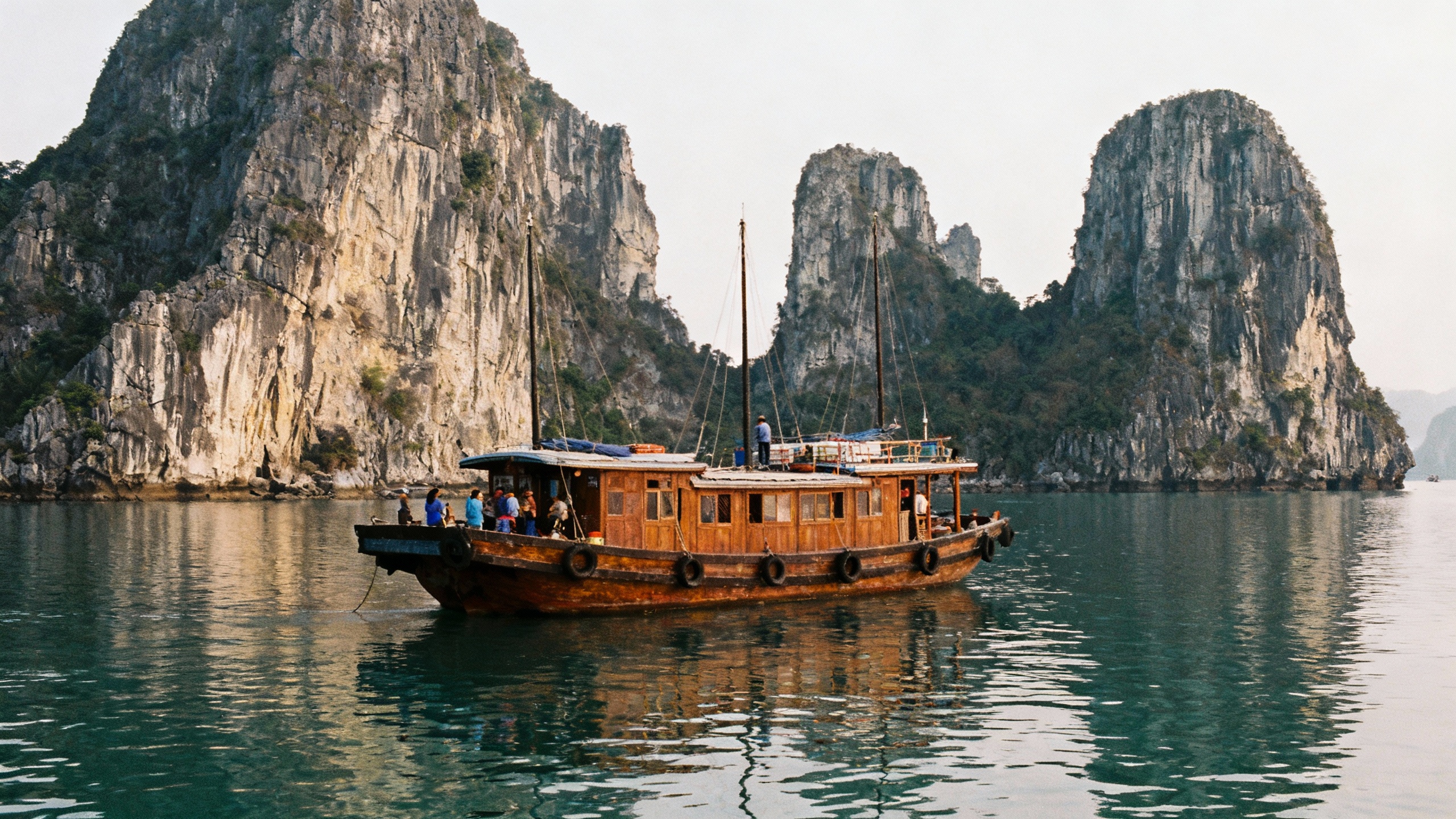Ha Long Bay, Vietnam boats and limestone cliffs