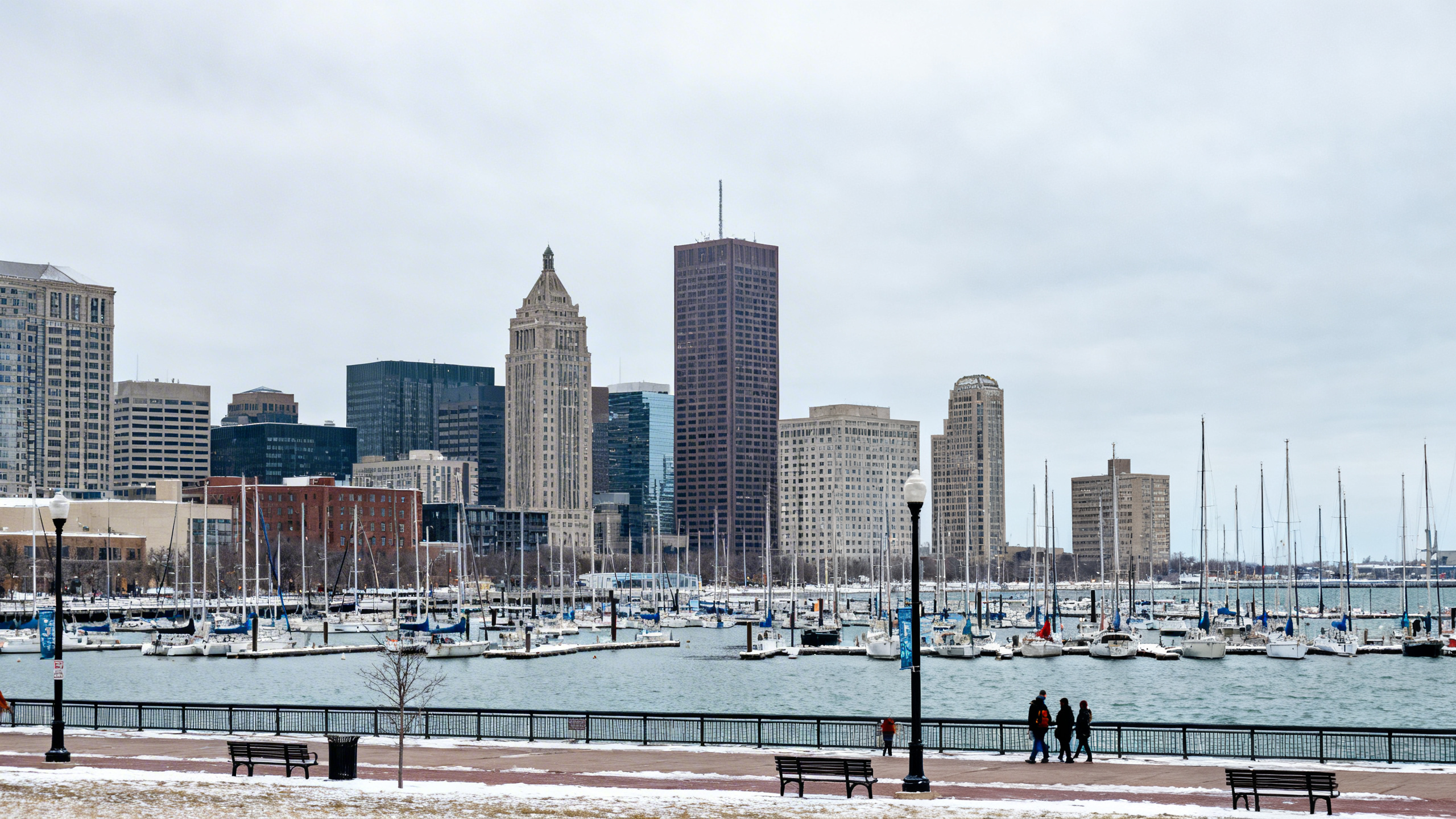 Milwaukee’s lakefront harbor with sailing boats and skyline under an overcast winter sky