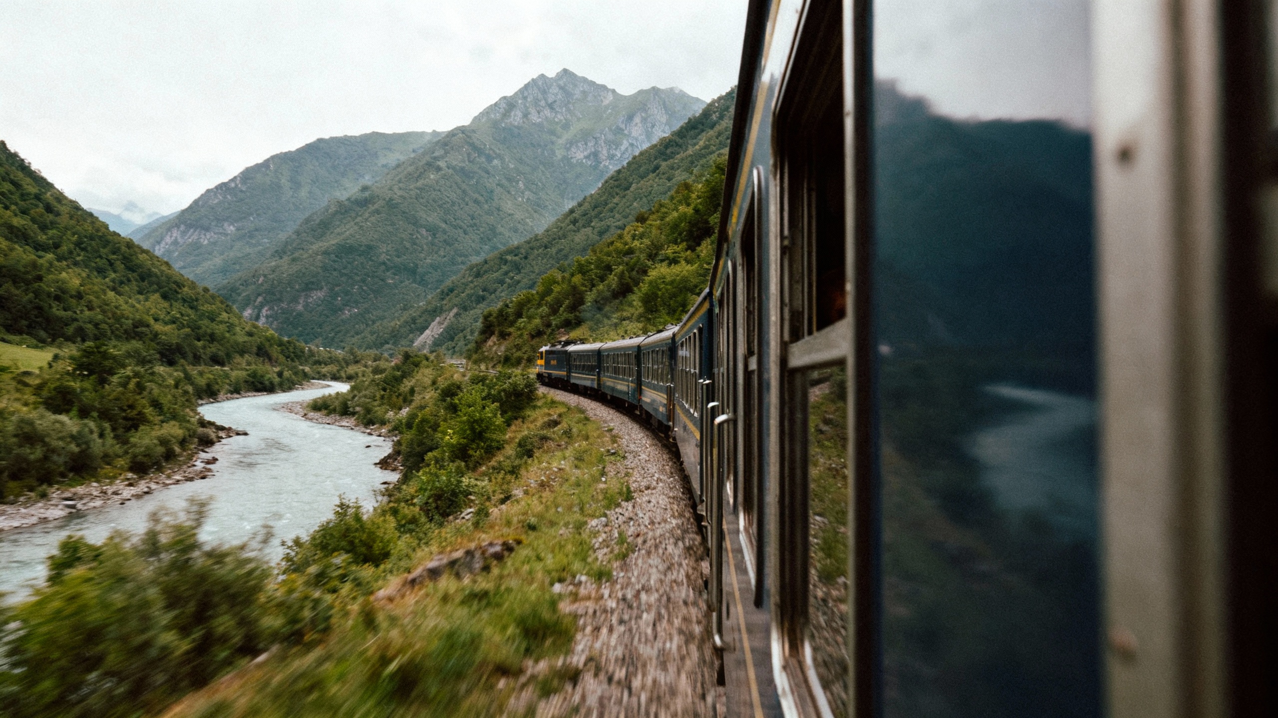 scenic train mountain river travel