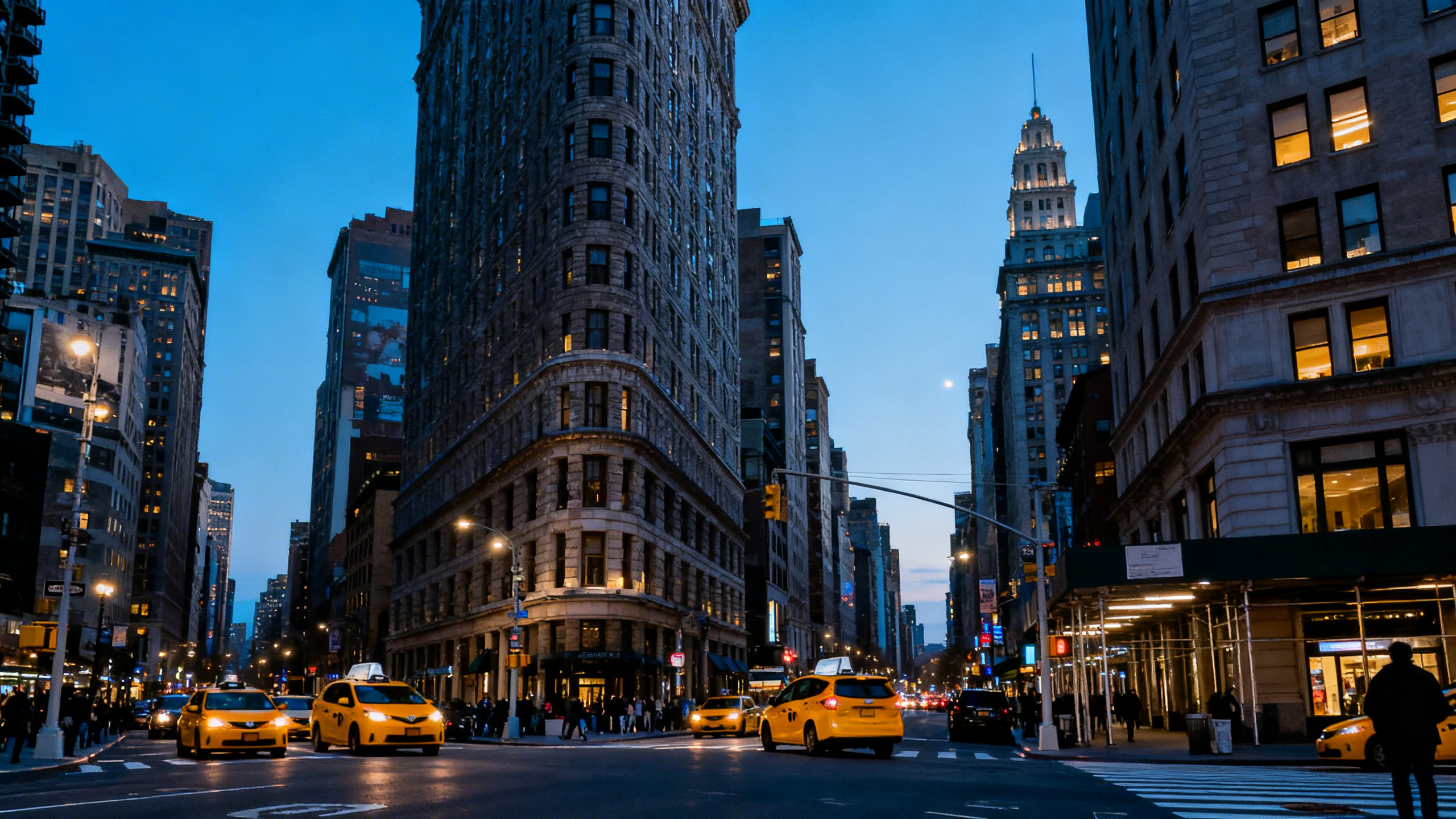 Skyscrapers, yellow taxis, and the bustling street life of Midtown Manhattan in New York City on a clear day