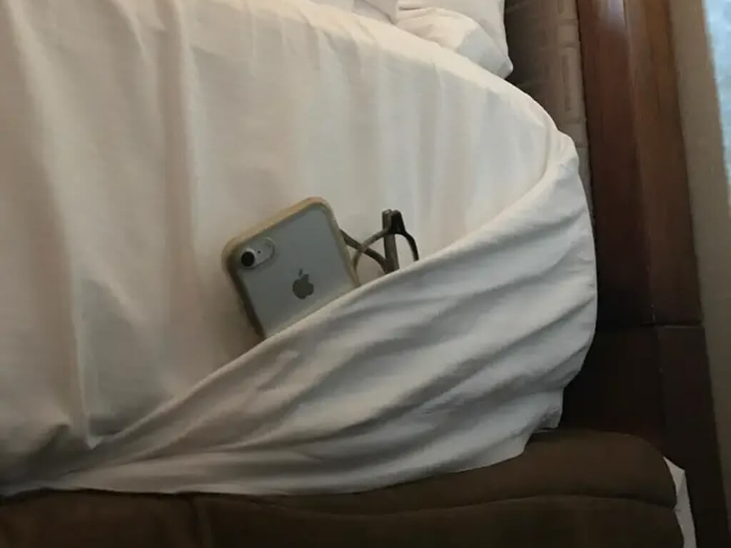 Create a Convenient Storage Spot by Folding Back Bed Sheets